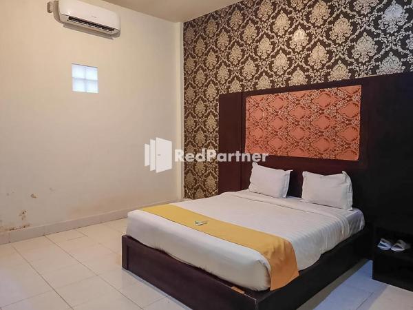 Hotel Puri Yasmin Potowanua Lasusua Mitra RedDoorz, Rezervovat Hotel Hotely v Sulawesi s parkováním, Parkování