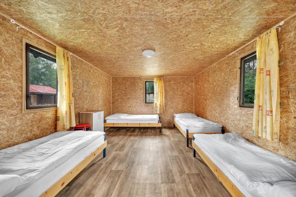 Chatová osada Bílý Kámen, Rezervovat  Doksy Macha Lake