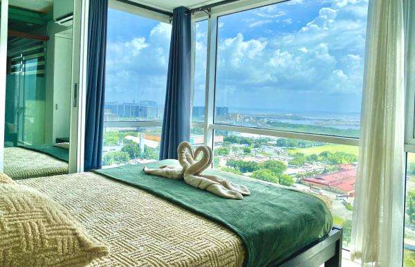 Stunning view staycation near MOA PICC WORLD TRADE CENTER AIRPORT LUNETA PARK MANILA OCEAN PARK QURINO GRANDSTAND, Rezervovat  Luzon hotely s parkováním, Parkování