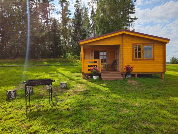 Atpūta Priedītēs - koka namiņi pie Tērvetes Dabas parka ar zirgiem, ponijiem un dabas tuvumu, Rezervovat  Tērvete 