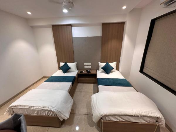 Hotel Royal Bloom, Rezervovat  Súrat Gujarat