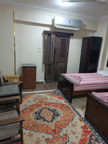 فندق الإيمان El Eman Hotel, Rezervovat  Maḩaţţat Idfū Asuán
