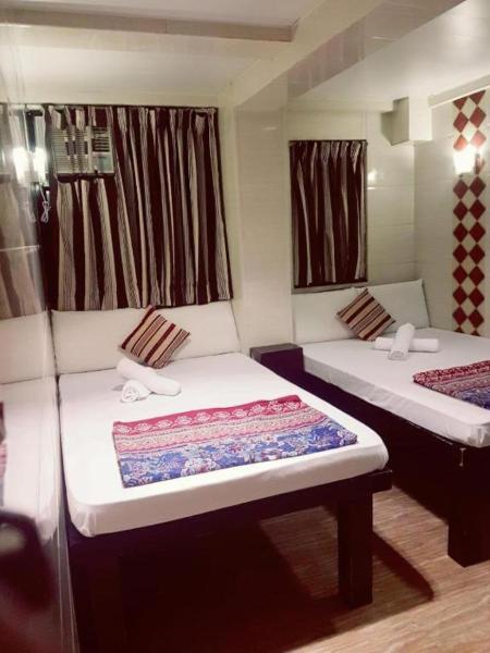 Happy Land Inn 6 F, Rezervovat Hotel Tsim Sha Tsui Hongkong