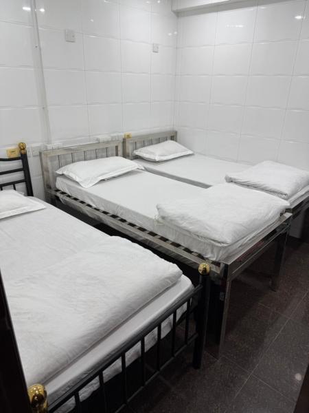 Angel paradise guest house, Rezervovat  Tsim Sha Tsui Hongkong