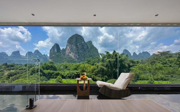 Yangshuo Bamboo Riverfront Guesthouse, Rezervovat  Xingping Guangxi