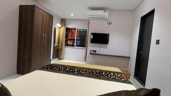 Amrut Inn, Rezervovat  Māvalli Karnataka