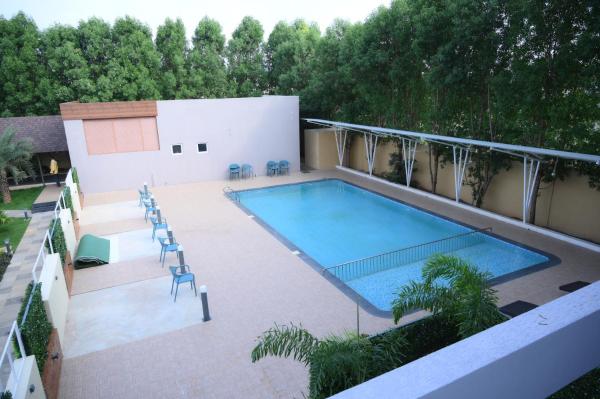 Shettar\s Kusum Resort, Rezervovat  Badami hotely s bazénem, Bazén