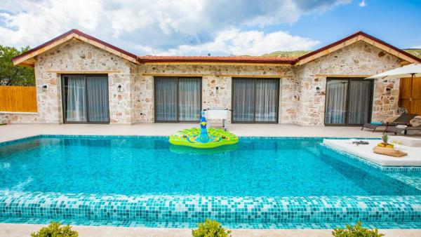 Saribelen Village 2 Bedroom Villa, Rezervovat  Kalkan 