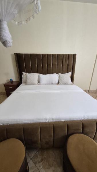 Kamstay Near the Airport, Rezervovat  Entebbe 