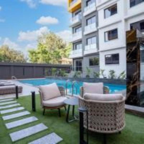 Spacious executive three bedroom apartment with amazing facilities,high speed wifi,swimming pool,fully equipped gym and close proimity to major shopping malls and restaurants and designated child play area, Rezervovat Apartmán Nairobi Nairobi