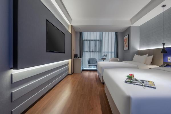 Zhijiang Huifeng Huanman Hotel, Rezervovat  Zhijiang Hunan